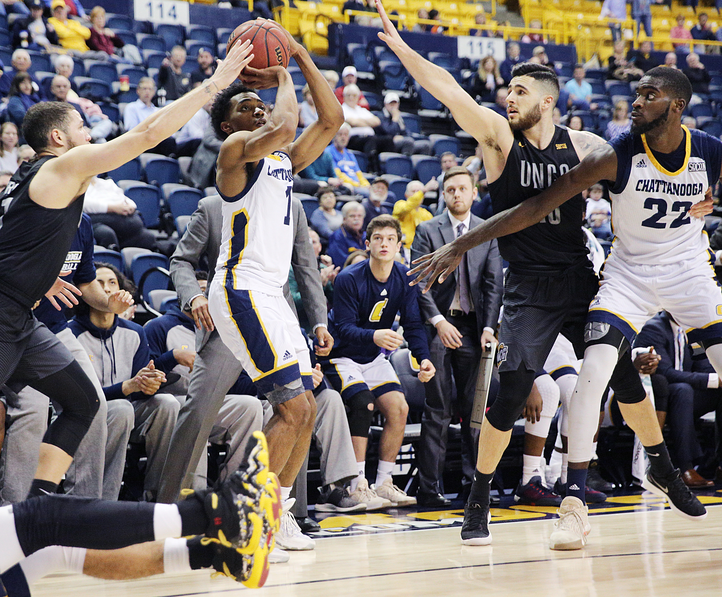 University of Tennessee at Chattanooga's Rodney Chatman (1) hits a shot to keep UTC in the game during the UTC vs. University of North Carolina Greensboro men's basketball game Monday, Jan. 29, 2018 at McKenzie Arena at UTC in Chattanooga, Tenn.
