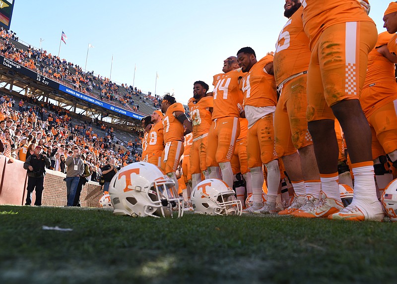 Most of the University of Tennessee football team joins fans in the south end zone in singing the Tennessee Waltz after winning 24-0 in their homecoming game against North Texas.