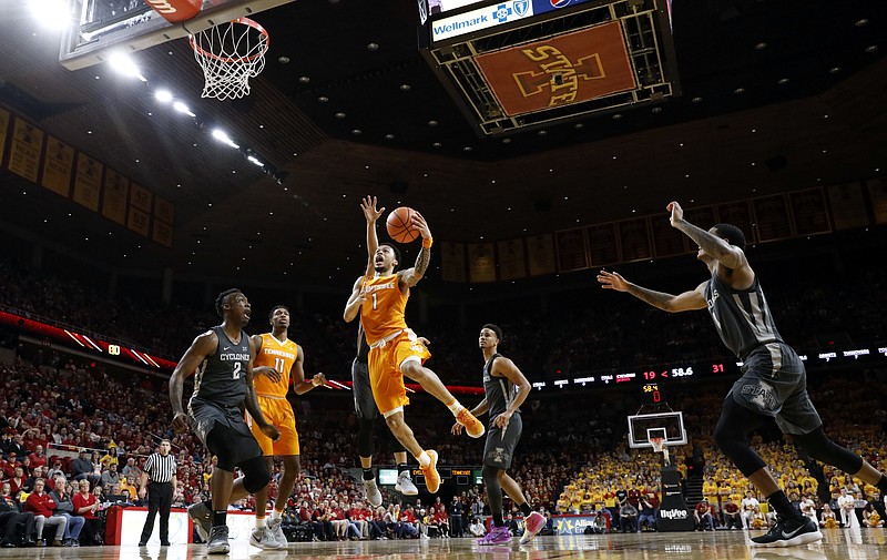 Tennessee guard Lamonte Turner (1) drives to the basket over Iowa State forward Cameron Lard (2) during the first half of an NCAA college basketball game, Saturday, Jan. 27, 2018, in Ames, Iowa. (AP Photo/Charlie Neibergall)