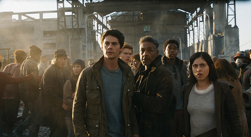 This undated image released by Twentieth Century Fox shows, foreground from left, Dylan O'Brien, Giancarlo Esposito and Rosa Salazar in a scene from "Maze Runner: The Death Cure." "Maze Runner: The Death Cure" is the highest grossing film of the weekend, but according to studio estimates Sunday, Jan. 28, 2018, many moviegoers also chose the first weekend after Oscar nominations to catch up with some awards contenders like "The Shape of Water, " which got a 161 percent boost in its ninth weekend in theaters. (Twentieth Century Fox via AP, File)