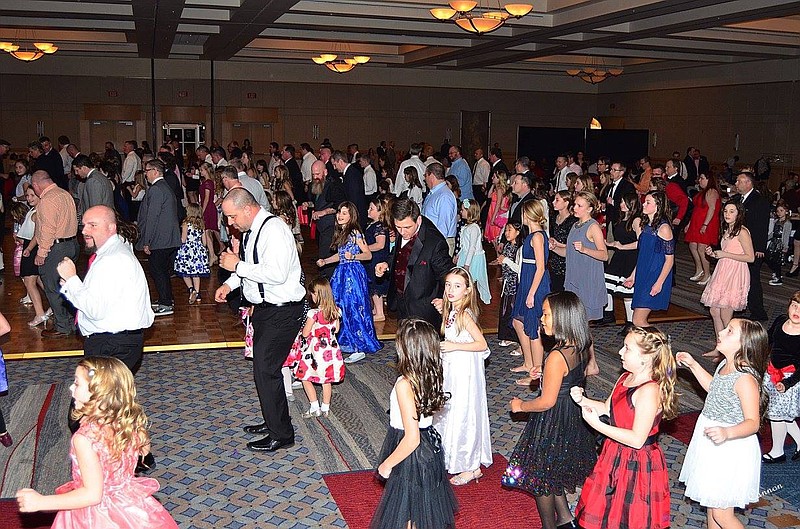 Hamilton County Parks and Recreation Department's annual Father-Daughter Dance draws hundreds of dads and their daughters of all ages to the Chattanooga Convention Center. (Sheila Cannon Photo)