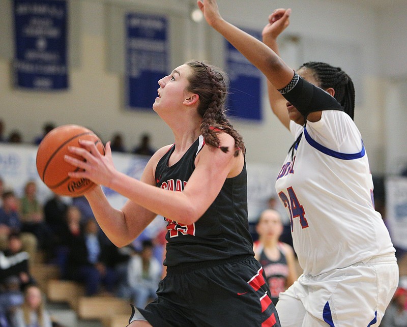 Signal Mountain's Olivia Koontz (45) puts up a shot while being guarded by Red Bank's Bailey Lee (34) during the Red Bank vs. Signal Mountain girls' basketball game Tuesday, Jan. 30, 2018 at Red Bank High School in Red Bank, Tenn.