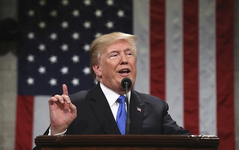 President Donald Trump delivers his first State of the Union address in the House chamber of the U.S. Capitol to a joint session of Congress Tuesday, Jan. 30, 2018 in Washington. (Win McNamee/Pool via AP)