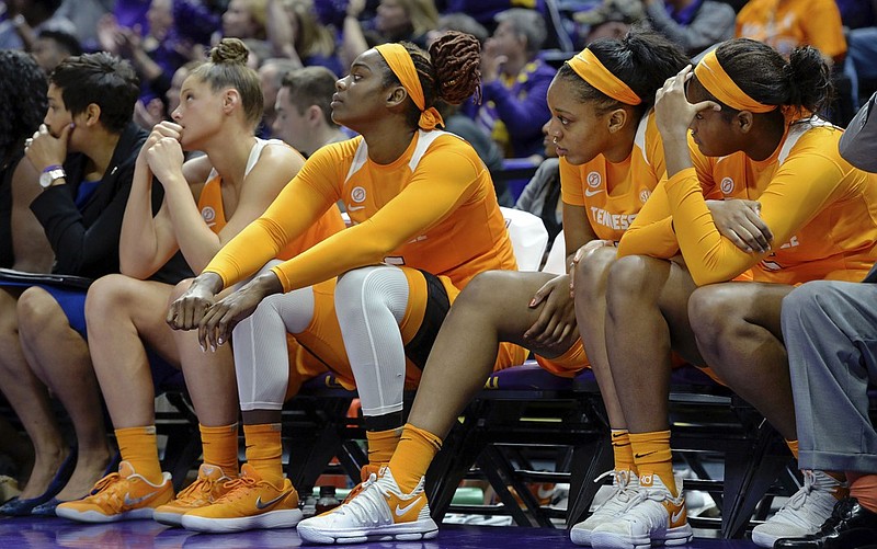 From second from left, Tennessee basketball players Kortney Dunbar, Cheridene Green, Kasiyahna Kushkituah and Kamera Harris watch the final moments of Sunday's loss at unranked LSU. The No. 12 Lady Vols host 14th-ranked Texas A&M tonight.