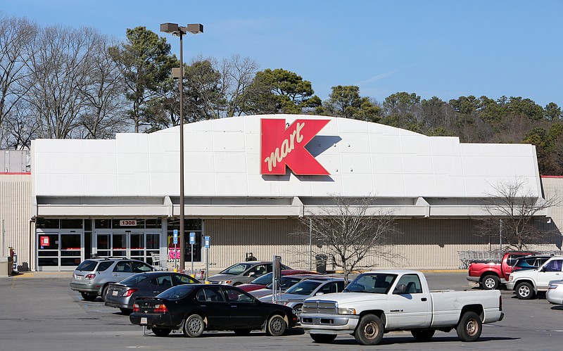 Shopper's cars partially fill the parking lot of Kmart which will soon be closing for good Wednesday, Jan. 31, 2018 in Dalton, Ga. Kmart will close in mid March and will be converted into retail. 