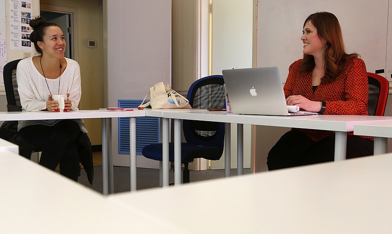 UnifiEd Director of Policy and Research Ashley Conrad, left, and Communications Director Natalie Cook smile while talking with the Times Free Press about their Apex Policy at the UnifiEd office on Wednesday, Jan. 31, 2018 in Chattanooga, Tenn.