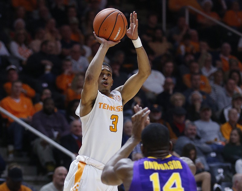 Tennessee guard James Daniel III (3) shoots over LSU guard Randy Onwuasor during the second half of an NCAA college basketball game Wednesday, Jan. 31, 2018, in Knoxville, Tenn. (AP Photo/Crystal LoGiudice)
