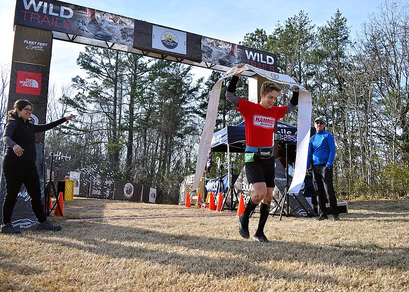 John Kelly, 33, of Rockville, Md., crosses the finish line as the winner of the 2017 Lookout Mountain 50 Miler trail race, which served as the Road Runners Club of America 2017 National Ultra Championship. (Staff photo by Mark Pace)