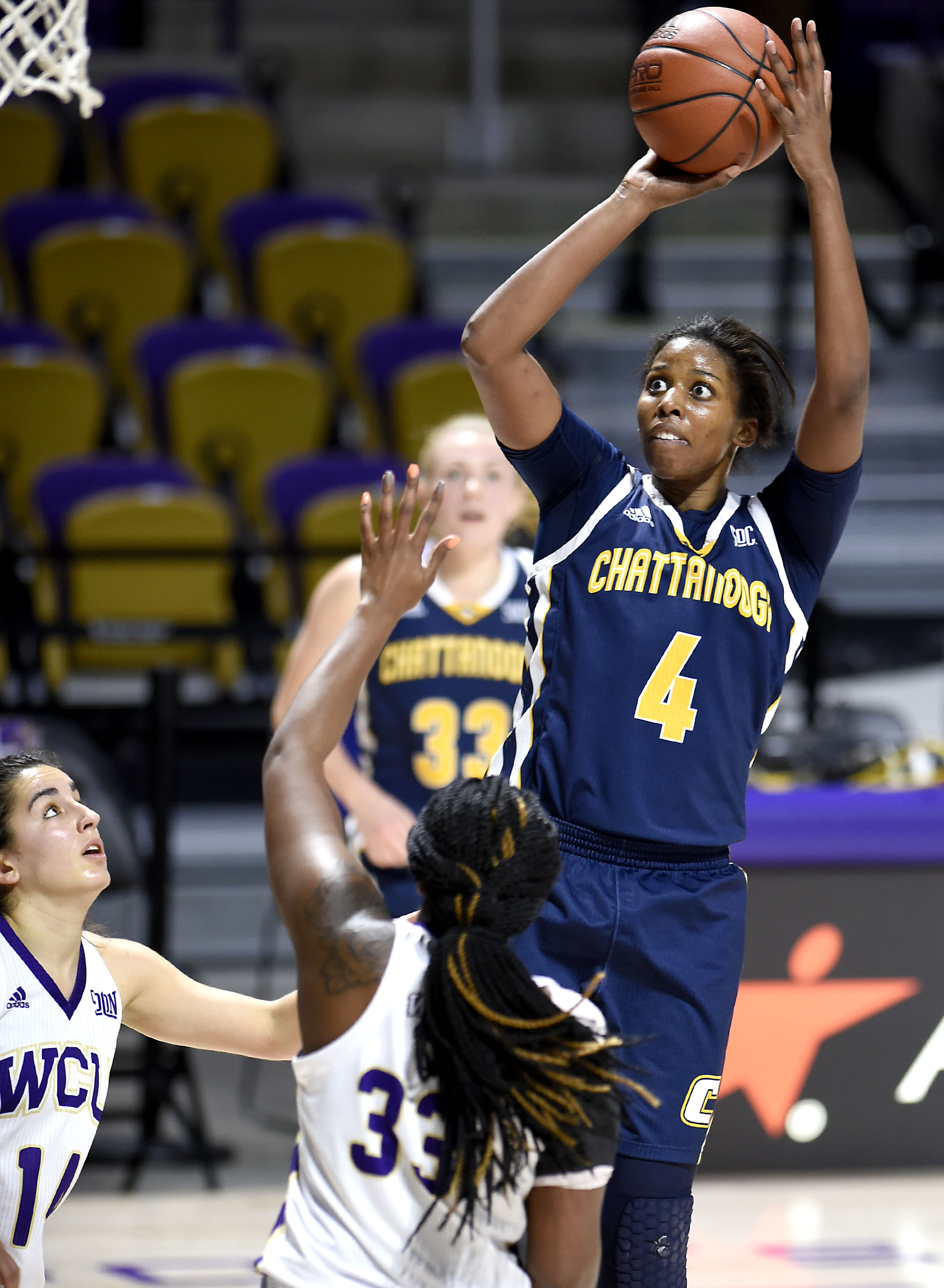 UTC's Arianne Whitaker (4) hits a jump shot from the paint. The University of Tennessee Mocs visited the Western Carolina Catamounts in Southern Conference women's basketball action at the Ramsey Center in Cullowhee, North Carolina on February 1, 2018