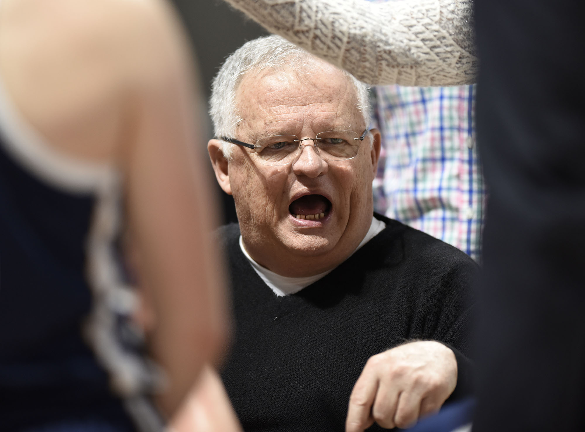 Chattanooga head coach Jim Foster instructs his team during a timeout. The University of Tennessee Mocs visited the Western Carolina Catamounts in Southern Conference women's basketball action at the Ramsey Center in Cullowhee, North Carolina on February 1, 2018