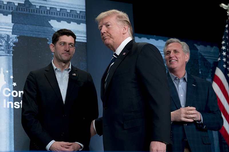 President Donald Trump, accompanied by House Speaker Paul Ryan of Wis., left, and House Majority Leader Kevin McCarthy of Calif., right, arrives to speak at the 2018 House and Senate Republican Member Conference at The Greenbrier, in White Sulphur Springs, WVa., Thursday, Feb. 1, 2018. (AP Photo/Andrew Harnik)