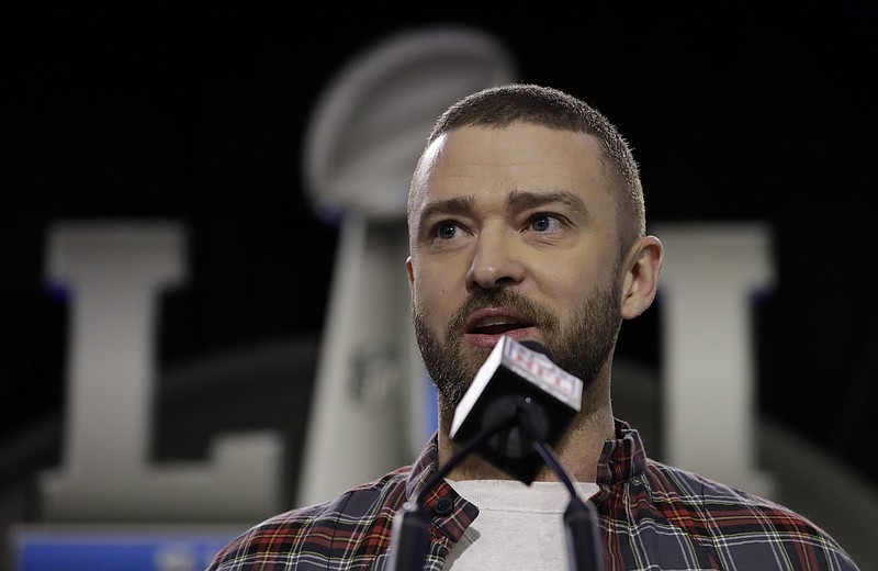 
              Justin Timberlake answers questions during a news conference for the NFL Super Bowl 52 football game halftime show Thursday, Feb. 1, 2018, in Minneapolis. (AP Photo/Matt Slocum)
            
