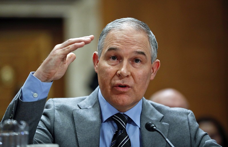 In this Jan. 30, 2018, photo, Environmental Protection Agency administrator Scott Pruitt testifies before the Senate Environment Committee on Capitol Hill in Washington. Newly released emails show Pruitt personally monitored efforts last year to excise much of the information about climate change from the agency's website, especially President Obama's signature effort to reduce planet-warming carbon emissions from coal-fired power plants. (AP Photo/Pablo Martinez Monsivais)