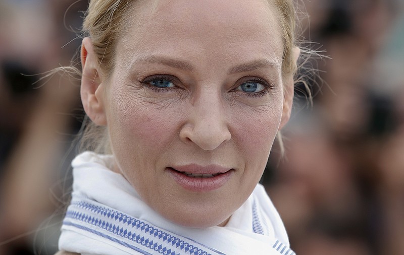 FILE - In this May 18, 2017 file photo, actress Uma Thurman poses for photographers during the photo call for the Un Certain Regard jury at the 70th international film festival, Cannes, southern France. 