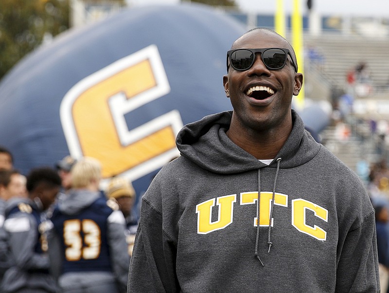 Former UTC and NFL wide receiver Terrell Owens laughs on the sideline during the Mocs' football game against Western Carolina in October 2015 at Finley Stadium. Owens is headed to the Pro Football Hall of Fame.