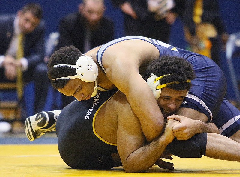 University of Tennessee at Chattanooga's Bryce Carr attempts to pin Appalachian State's Alan Cothier during the 184-pound matchup Sunday, Feb. 4, 2018 at McClellan Gym at UTC in Chattanooga, Tenn. 