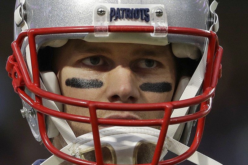 New England Patriots quarterback Tom Brady warms up before the NFL Super Bowl 52 football game against the Philadelphia Eagles Sunday, Feb. 4, 2018, in Minneapolis. (AP Photo/Matt Slocum)