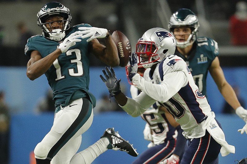 New England Patriots strong safety Duron Harmon (30) breaks up a pass intended for Philadelphia Eagles wide receiver Nelson Agholor (13), during the second half of the NFL Super Bowl 52 football game Sunday, Feb. 4, 2018, in Minneapolis. (AP Photo/Charlie Neibergall)