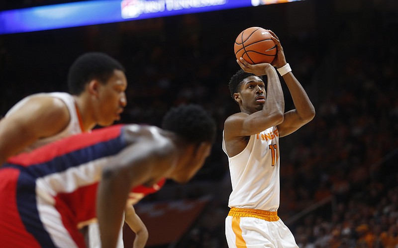 Tennessee forward Kyle Alexander (11) shoots free throws against Mississippi in the first half of an NCAA college basketball game Saturday, Feb. 3, 2018, in Knoxville, Tenn. (AP Photo/Crystal LoGiudice)