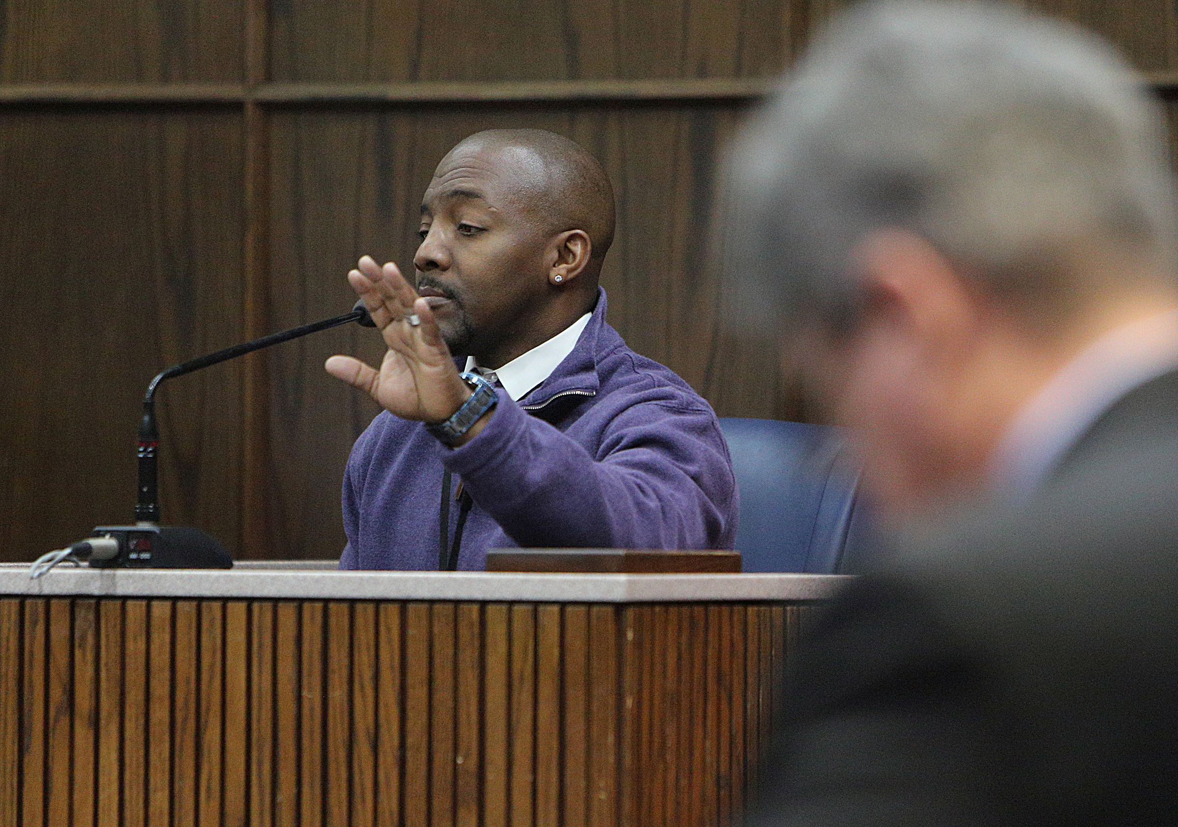 Carlis Shackelford, a former behavior specialist at Woodmore Elementary School, testifies to his interactions with Johnthony Walker prior to the November 2016 Woodmore crash that killed six children during a pretrial hearing in Walker's case Monday, Feb. 5, 2018 in Judge Don Poole's courtroom at the Hamilton County Criminal Courthouse in Chattanooga, Tenn. Shackelford testified to one case in which he had to mediate an argument on the bus between students and Walker as well as another case in which he reported Walker for driving away from the school at what Shackelford believed to be an unsafe speed.