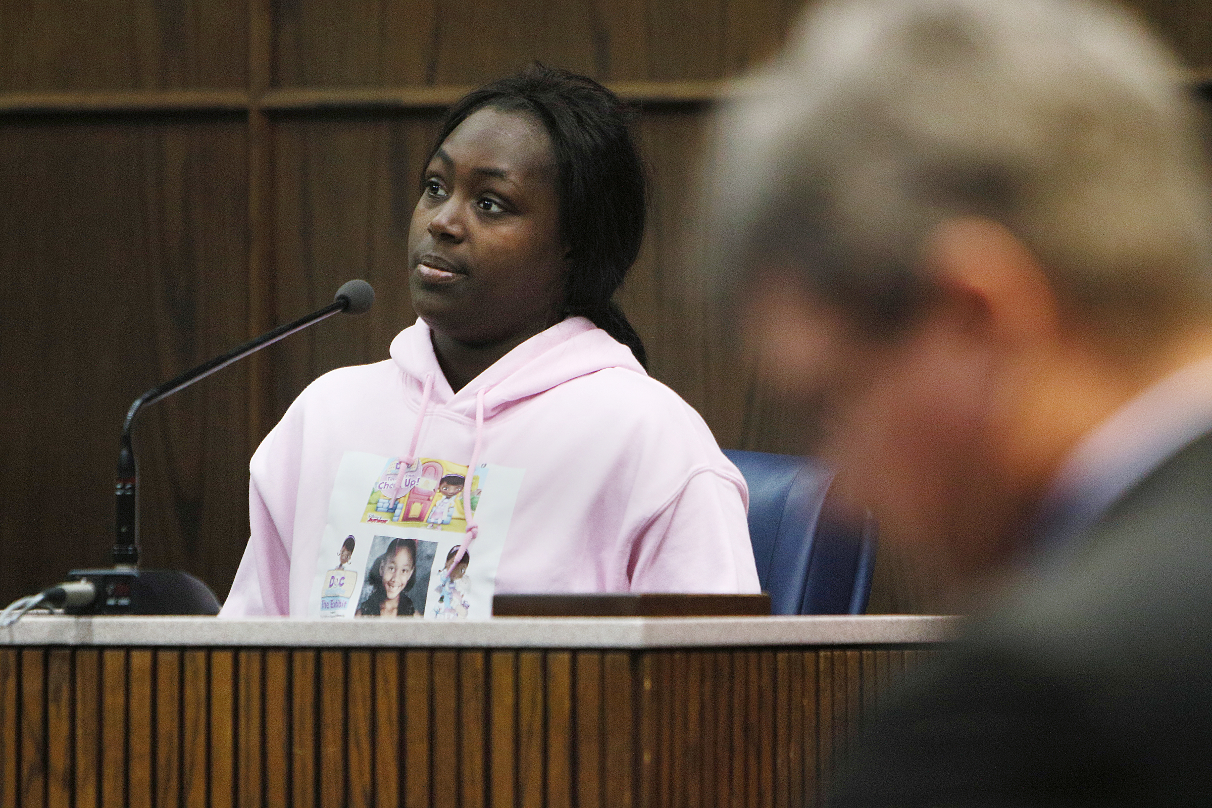 Jasmine Mateen, one of the mothers who lost a child in the Woodmore Elementary School bus crash in November of 2016, testifies during a pretrial hearing in the Johnthony Walker case Monday, Feb. 5, 2018 in Judge Don Poole's courtroom at the Hamilton County Criminal Courthouse in Chattanooga, Tenn. Mateen testified that she reported several incidents in which Walker was driving too quickly in the neighborhood and cursing at her children.