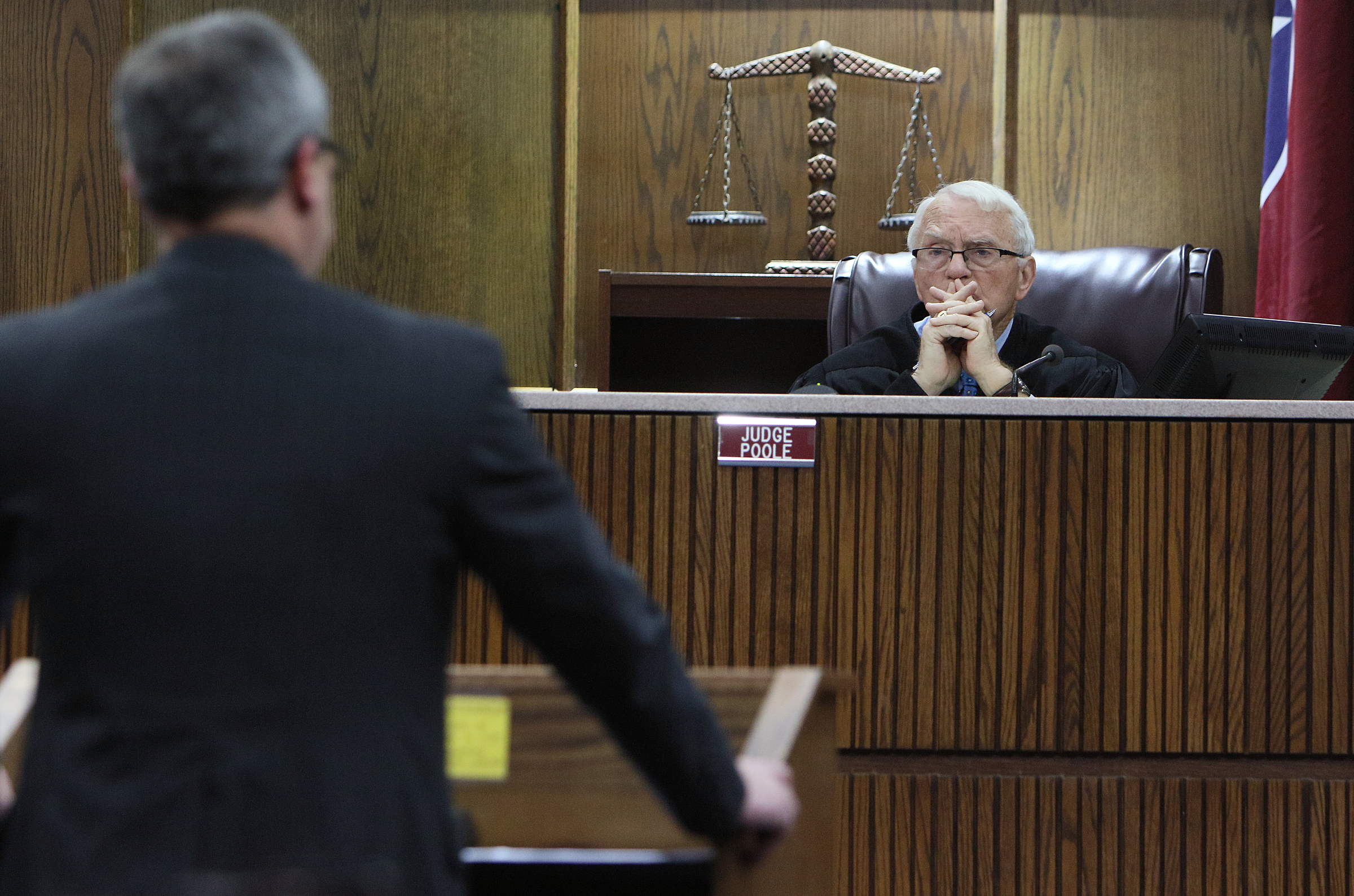 Judge Don Poole listens as Hamilton County District Attorney General Neal Pinkston speaks during a pretrial hearing in the Johnthony Walker case Monday, Feb. 5, 2018 at the Hamilton County Criminal Courthouse in Chattanooga, Tenn. Walker was the bus driver in the Nov. 21, 2016 fatal bus crash that killed six Woodmore Elementary Students.