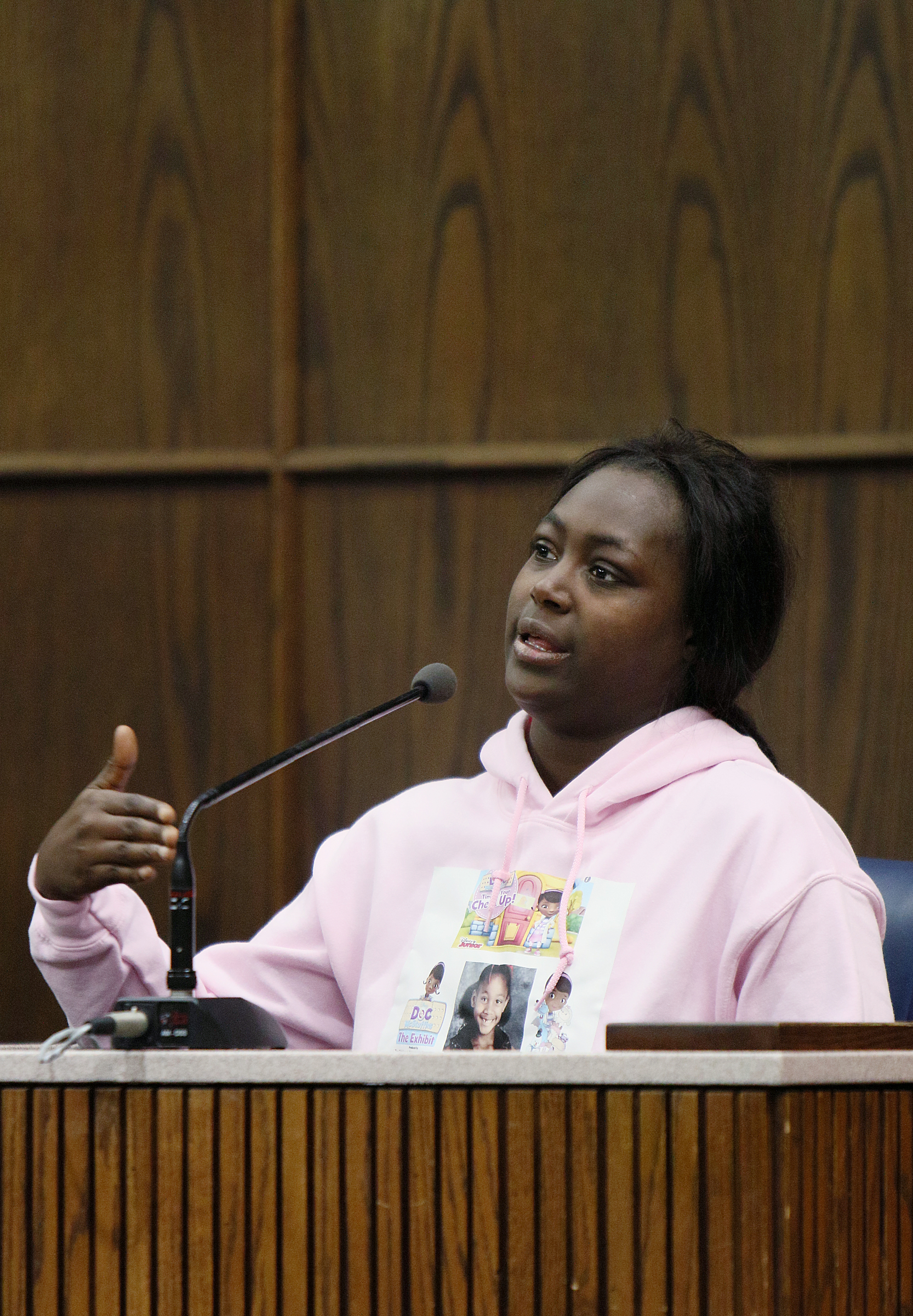 Jasmine Mateen, one of the mothers who lost a child in the Woodmore Elementary School bus crash in November of 2016, testifies during a pretrial hearing in the Johnthony Walker case Monday, Feb. 5, 2018 in Judge Don Poole's courtroom at the Hamilton County Criminal Courthouse in Chattanooga, Tenn. Mateen testified that she reported several incidents in which Walker was driving too quickly in the neighborhood and cursing at her children.