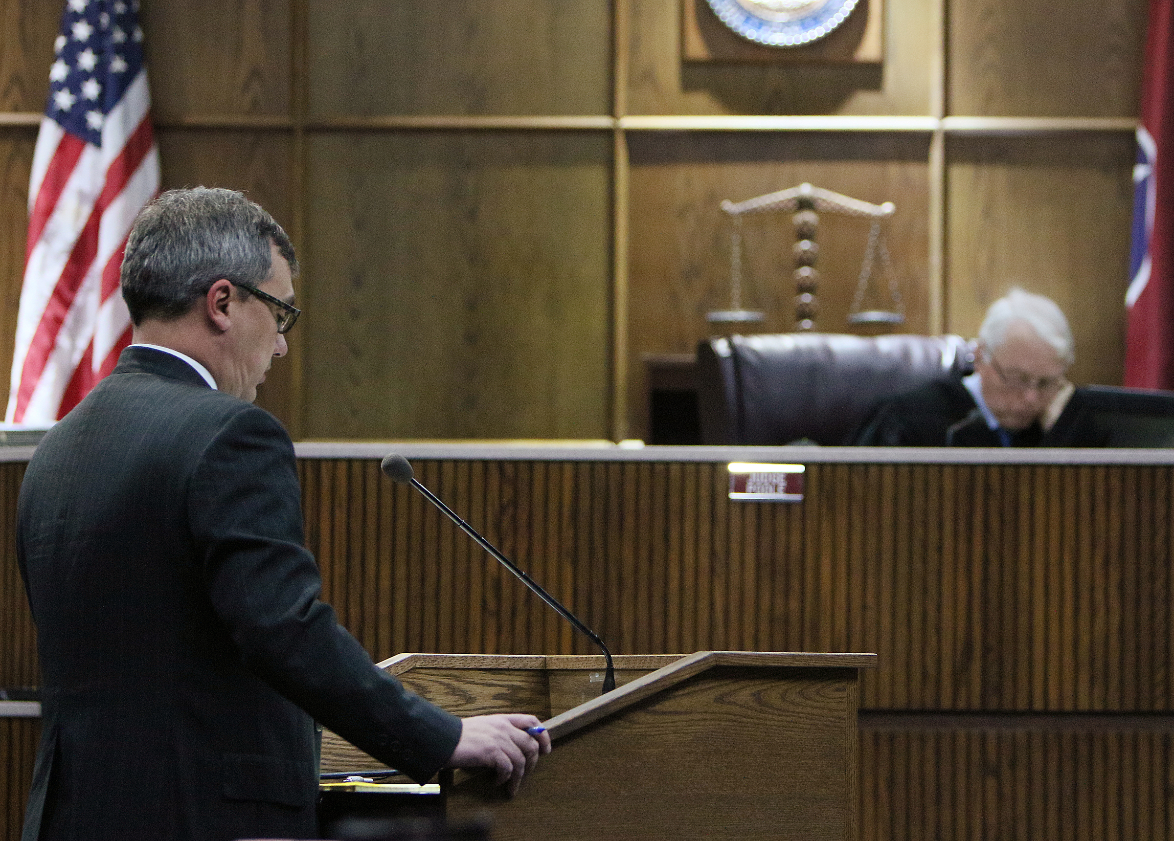 Hamilton County District Attorney General Neal Pinkston speaks to Judge Don Poole during a pretrial hearing in the Johnthony Walker case Monday, Feb. 5, 2018 in Judge Don Poole's courtroom at the Hamilton County Criminal Courthouse in Chattanooga, Tenn. Walker was the bus driver in the Nov. 21, 2016 fatal bus crash that killed six Woodmore Elementary Students.