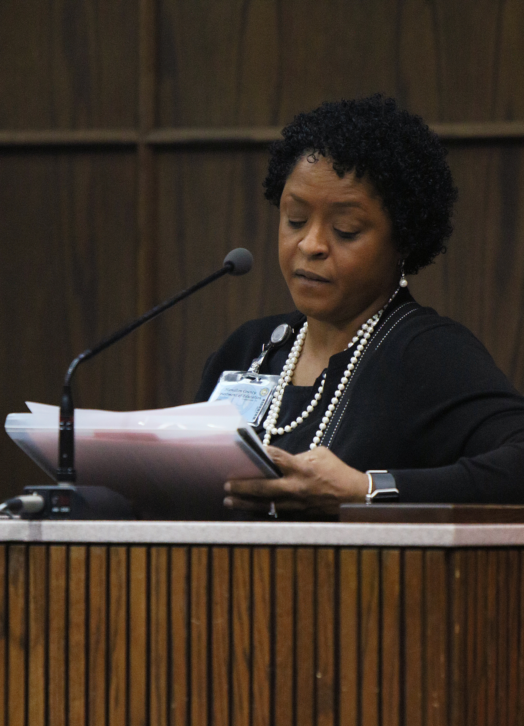Brenda Cothran, former principal at Woodmore Elementary School, looks through her notes for accuracy as she testifies during a pretrial hearing in the Johnthony Walker case Monday, Feb. 5, 2018 in Judge Don Poole's courtroom at the Hamilton County Criminal Courthouse in Chattanooga, Tenn. Cothran was testifying about complaints against Walker prior to the Woodmore bus crash incident that occurred November 21, 2016.