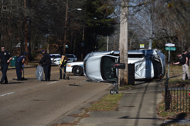 Chattanooga police investigate an overturned SUV in the 900 block of North Moore Road on Monday,  Feb. 5, 2018. 