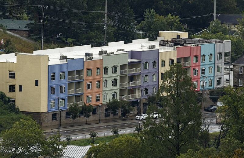 In this Sept. 13, 2017, staff file photo, North Market Street apartments constructed by local developer John Wise are seen from Stringer's Ridge in Chattanooga, Tenn.