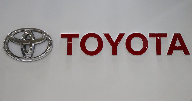 In this Nov. 13, 2017, photo, Toyota Logo is seen at its showroom in Tokyo. Toyota Motor Corp. reported Tuesday, Feb. 6, 2018 an October-December profit of 941.8 billion yen ($8.6 billion), up from 486.5 billion yen the same period the previous year. (AP Photo/Koji Sasahara)