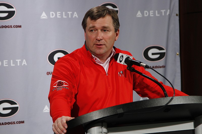 Georgia football coach Kirby Smart listens to a question about his No. 1 recruiting class during Wednesday afternoon's news conference in Athens.