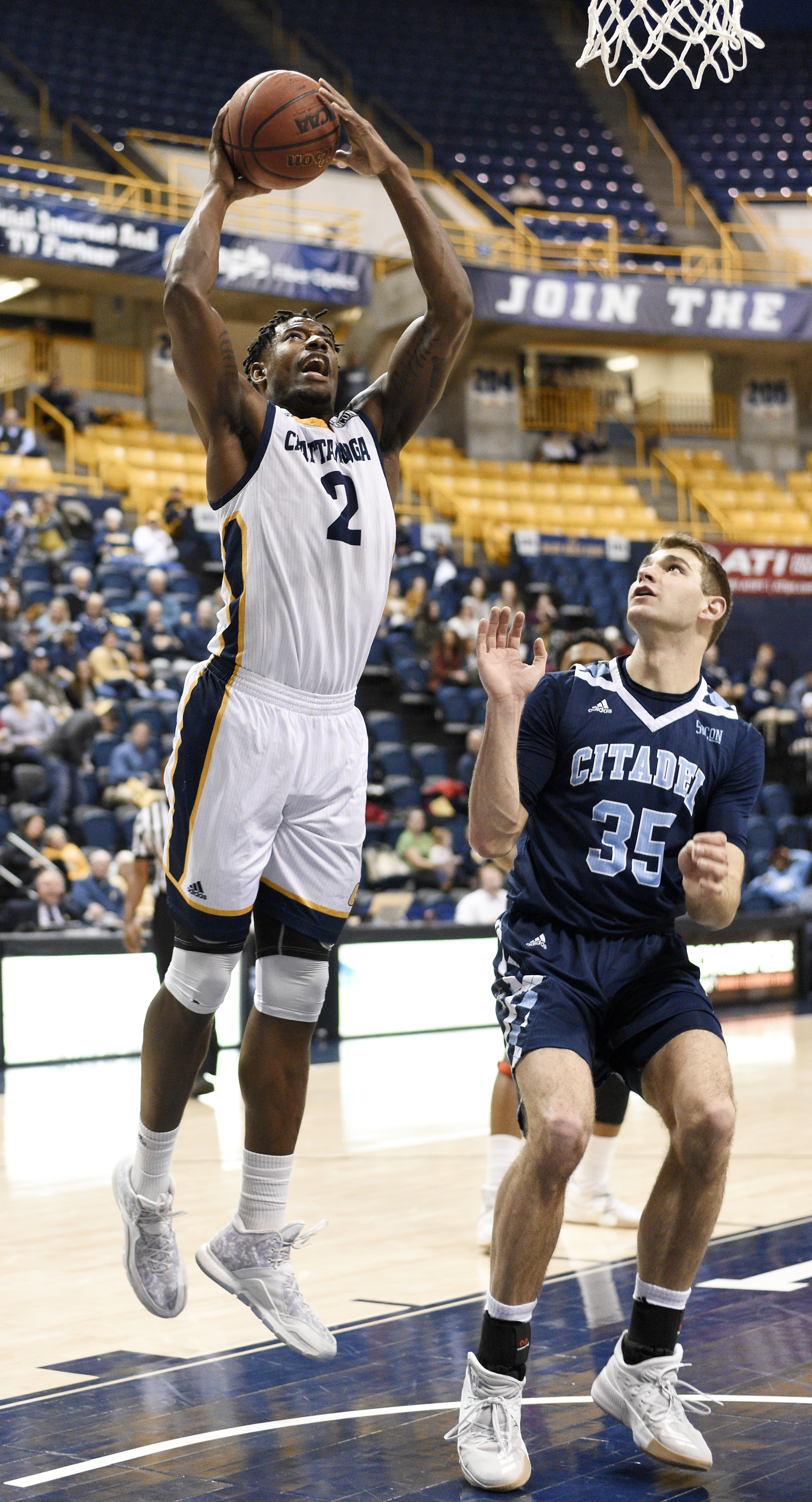 UTC's Joshua Phillips (2) scores over The Citadel's Zane Najdawi (35). The Citadel Bulldogs visited the University of Tennessee Chattanooga Mocs in Southern Conference basketball action at McKenzie Arena in Chattanooga, Tennessee on February 8, 2018.