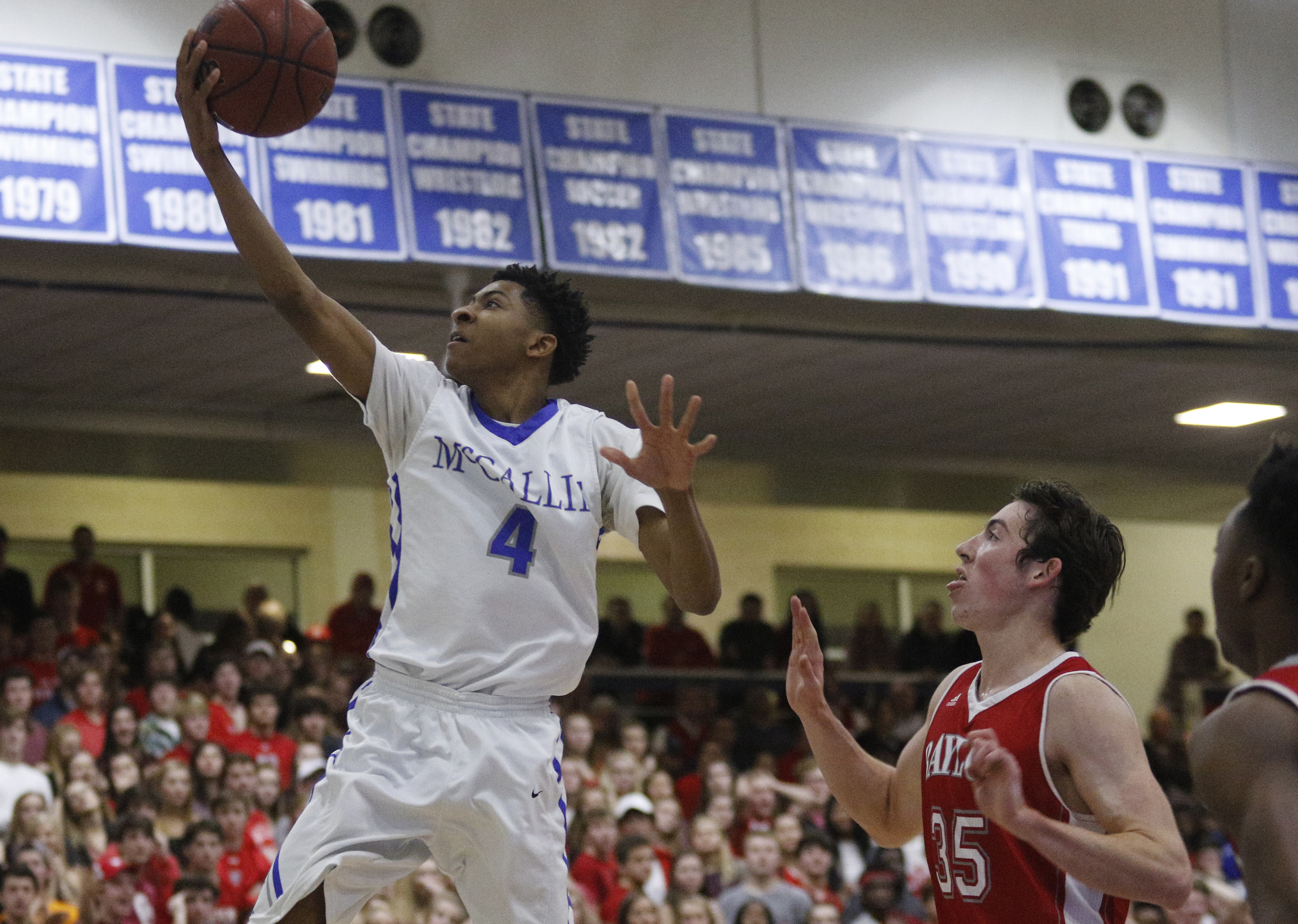 McCallie's Jr. Clay shoots ahead of Baylor's Patrick Urey during their prep basketball game at McCallie School on Friday, Jan. 27, 2017, in Chattanooga, Tenn.