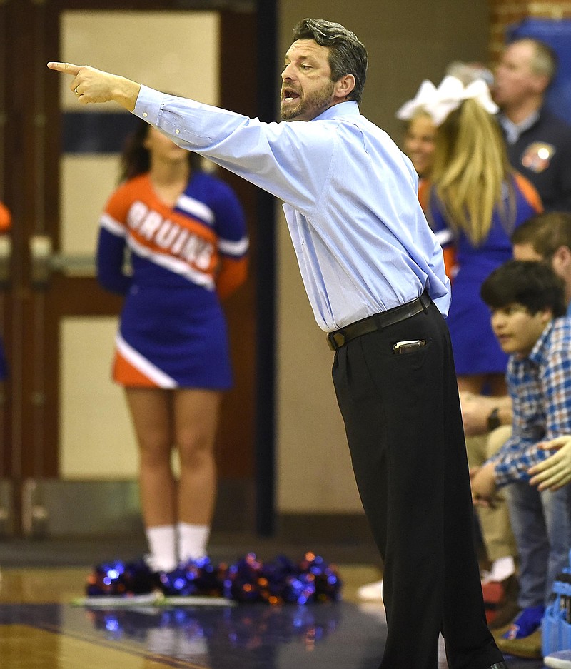 Northwest head coach Ryan Richards instructs his team from the sidelines.  The Perry Panthers visited the Northwest Whitfield Bruins in Georgia State Tournament Action on February 23, 2017.