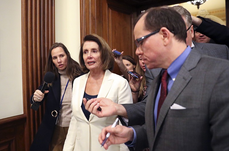 House Minority Leader Nancy Pelosi of Calif., speaks to reporters after she staged a record-breaking, eight-hour speech in hopes of pressuring Republicans to allow a vote on protecting "Dreamer" immigrants on Capitol Hill in Washington. Wednesday, Feb. 7, 2018. (AP Photo/Pablo Martinez Monsivais)