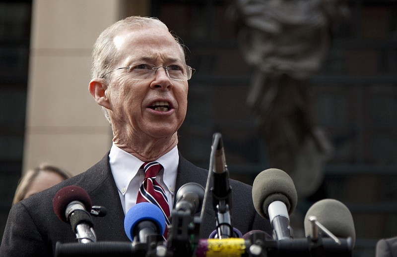 FILE - In this Jan. 26, 2012 file photo, Dana Boente, then First Assistant U.S. Attorney for the Eastern District of Virginia, speaks outside federal court in Alexandria, Va.
