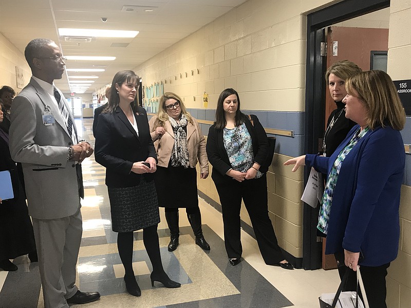 State Education Commissioner Candice McQueen, some of her staff members, including Christy Ballard, general counsel, and Laura Encalade, chief of staff, meet with Opportunity Zone leaders, Debbie Rosenow and Jill Levine, and Principal LaFrederick Thirkill at Orchard Knob Elementary School on Thursday, February 8. McQueen and members of her staff visited the school before a work session with the Hamilton County school board where McQueen presented the state's plan for the district's historically failing schools.