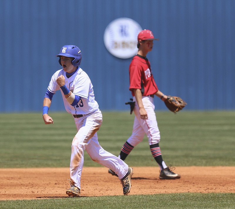 Ringgold's Holden Tucker celebrates a teammate's home run during a playoff game against Appling County last season. Tucker's speed on the basepaths is one reason the Tigers have high expectations again this year. GHSA baseball teams can play games starting Monday.