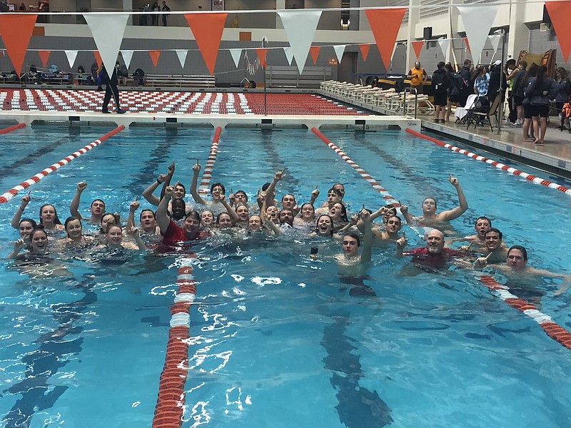Baylor swimming and diving team members celebrate the school's 13th consecutive combined team state championship.