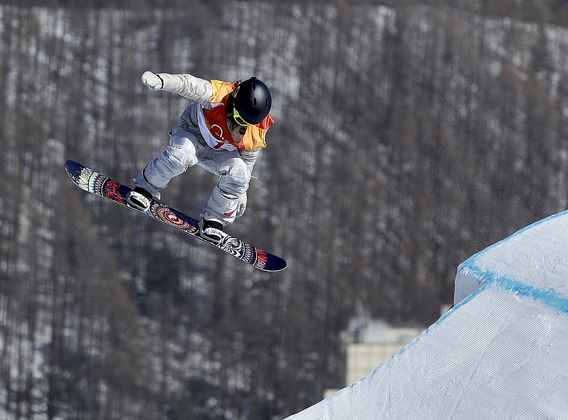 Jamie Anderson, of the United States, jumps during the women's slopestyle final at Phoenix Snow Park at the 2018 Winter Olympics in Pyeongchang, South Korea, Monday, Feb. 12, 2018. (AP Photo/Gregory Bull)