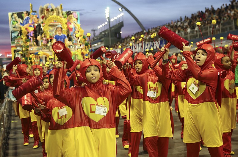 
              Dancers from the Vila Maria samba school perform during a carnival parade in Sao Paulo, Brazil, Sunday, Feb. 11, 2018. (AP Photo/Andre Penner)
            