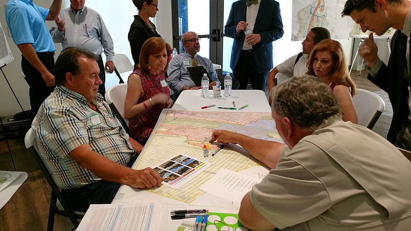 Residents from the eastern pocket of Hamilton County examine maps during one of the RPA's public input meetings for the area's comprehensive growth plan. (Contributed photo)