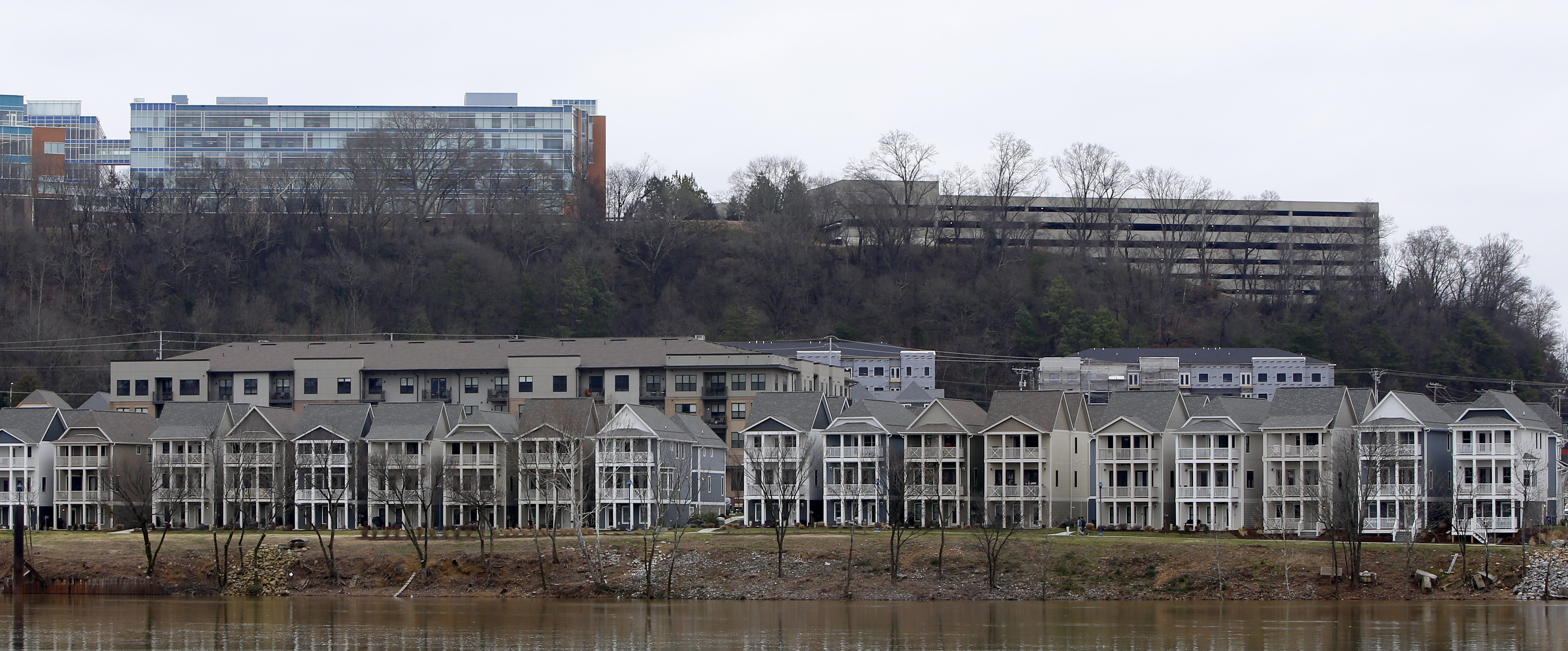 Homes are seen along the Tennessee River in the Cameron Harbor area on Monday, Feb. 12, 2018 in Chattanooga, Tenn.
