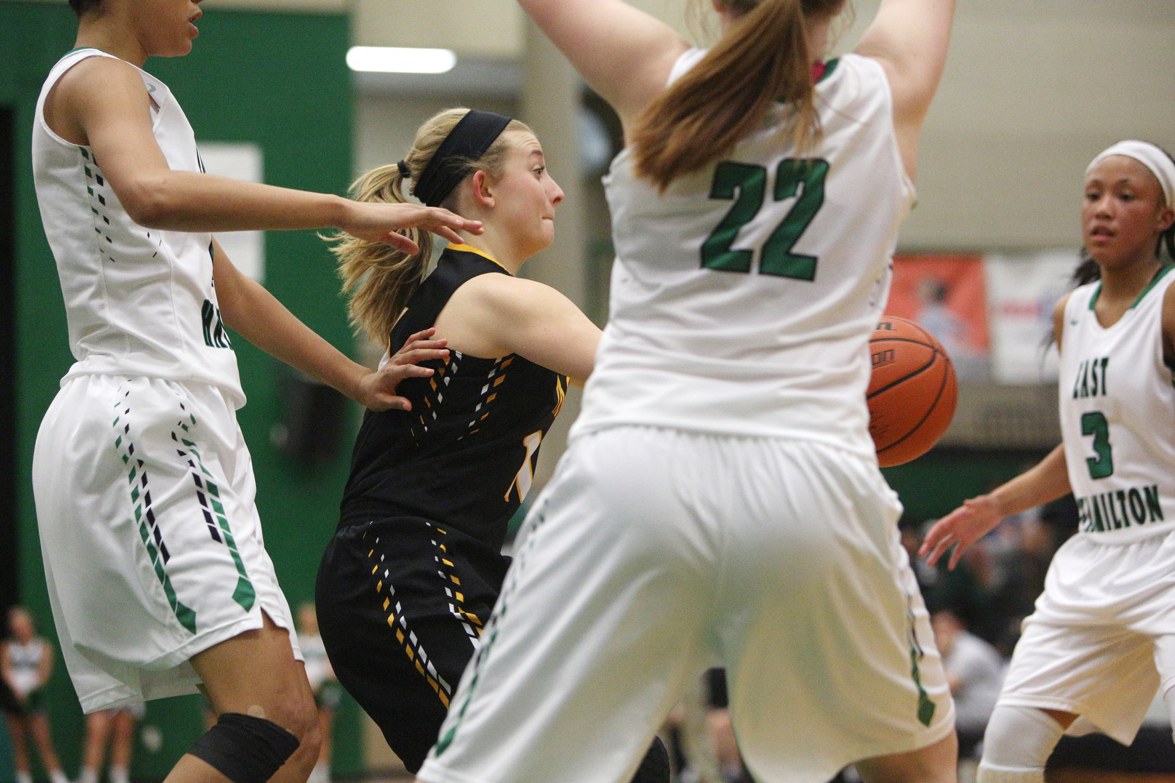 McMinn County's Hannah Burns (11) passes the ball to a teammate during the East Hamilton vs. McMinn County girls basketball game Monday, Feb. 12, 2018 at East Hamilton Middle High School in Ooltewah, Tenn.
