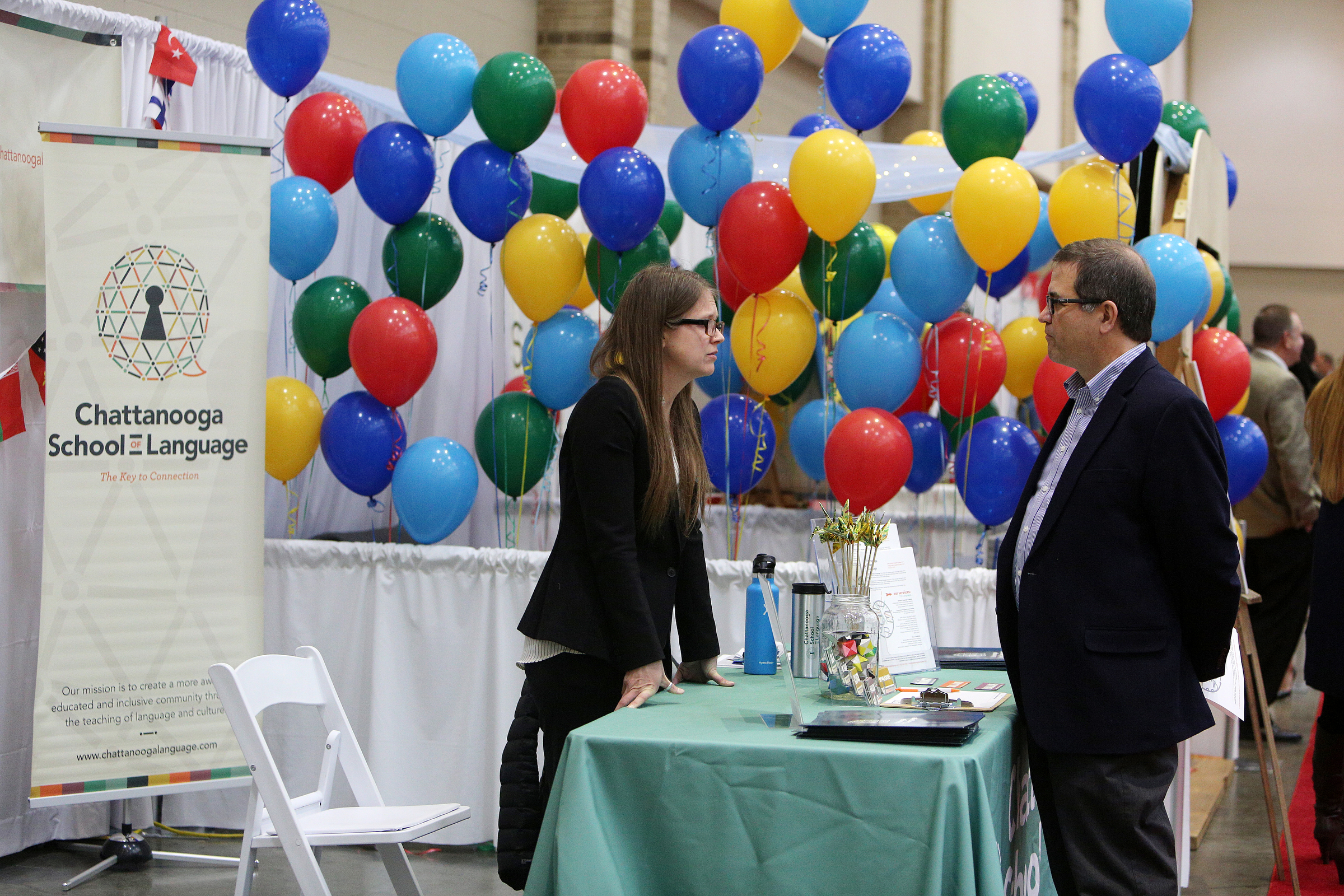 Laurie Stevens, owner and operator of Chattanooga School of Language, speaks with Wayne Collins during the Small Business Awards Luncheon at the Chattanooga Convention Center on Tuesday, Feb. 13, 2018 in Chattanooga, Tenn. Chattanooga School of Language won the Small Business Award for 1-20 employees category.