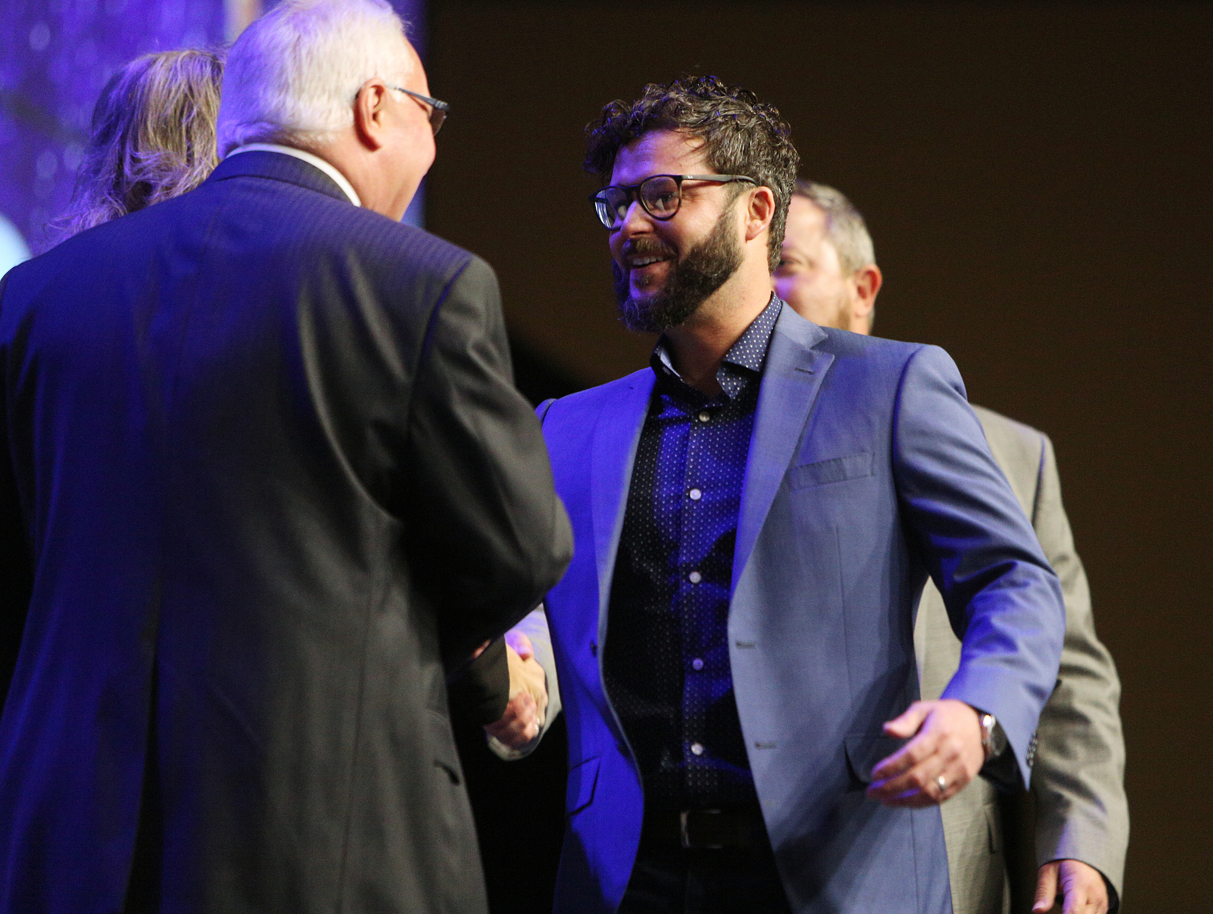 Justin Wilson and Russell Looper, co-founders of Manufacturing Repair and Overstock, accept the Small Business Award for the 21-44 employees category during the Small Business Awards Luncheon at the Chattanooga Convention Center on Tuesday, Feb. 13, 2018 in Chattanooga, Tenn. The event was put on by the Chattanooga Area Chamber of Commerce.