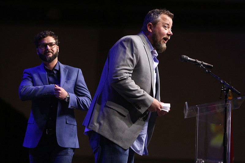 Justin Wilson and Russell Looper, co-founders of Manufacturing Repair and Overstock, accept the Small Business Award for the 21-44 employees category during the Small Business Awards Luncheon at the Chattanooga Convention Center on Tuesday, Feb. 13, 2018 in Chattanooga, Tenn. The event was put on by the Chattanooga Area Chamber of Commerce. 