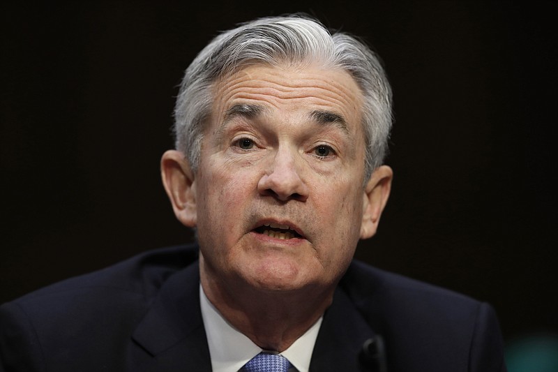 FILE - In this Nov. 28, 2017, file photo, Jerome Powell, President Donald Trump's nominee for chairman of the Federal Reserve, testifies during a Senate Banking, Housing, and Urban Affairs Committee confirmation hearing on Capitol Hill in Washington. Federal Reserve Chairman Powell said Tuesday, Feb. 13, 2018, that the global economy is recovering strongly for the first time in a decade, but the central bank needs to remain alert to any emerging risks to financial stability. (AP Photo/Carolyn Kaster, File)